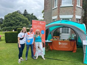 Annie, our Fundraising and Relationship Manager, Robert, one of our volunteers, and Carolyn, the Chair of our Board of Trustees, at the garden party.